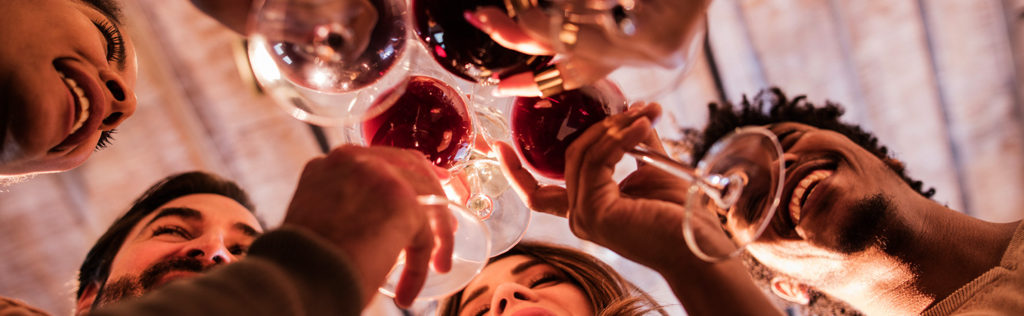 Friends holding wine glasses