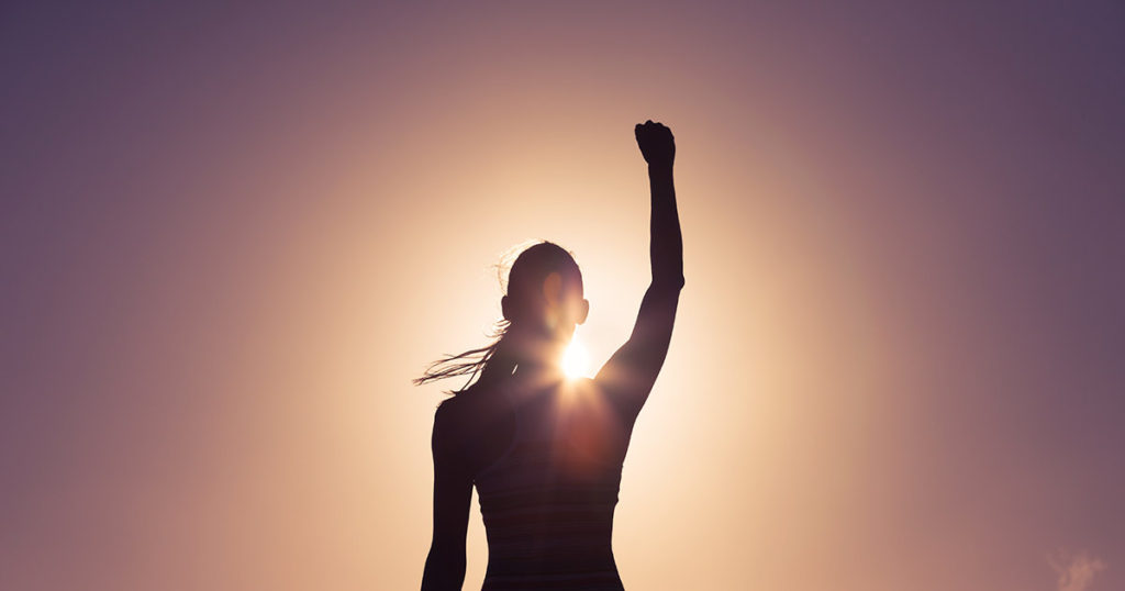 Woman reaching her goal