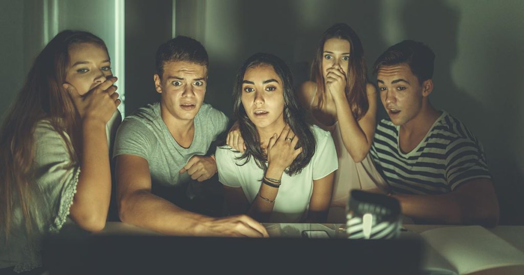 Students looking horrified at screen